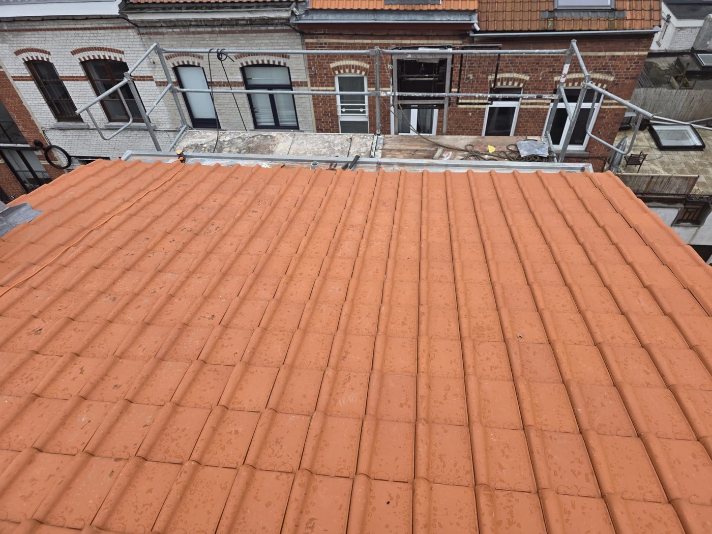 Couverture de toiture en tuiles refaite à Auderghem